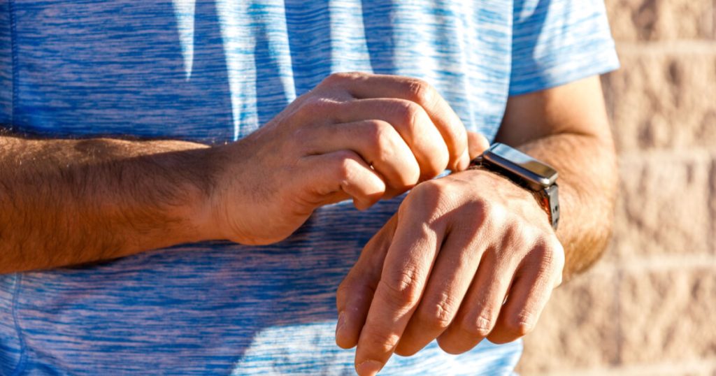 A close up of a watch that measures blood pressure