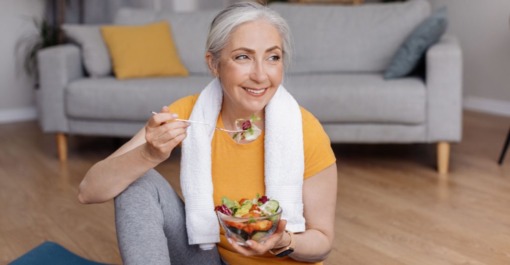 A Healthy Woman Holding Bowl