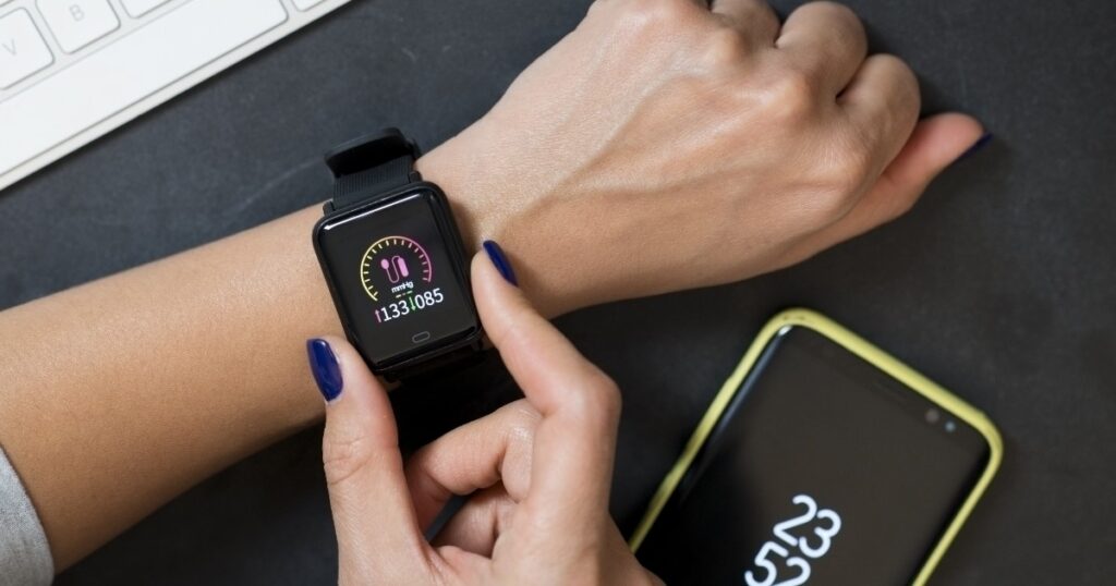 A person monitoring their blood pressure on a smart watch