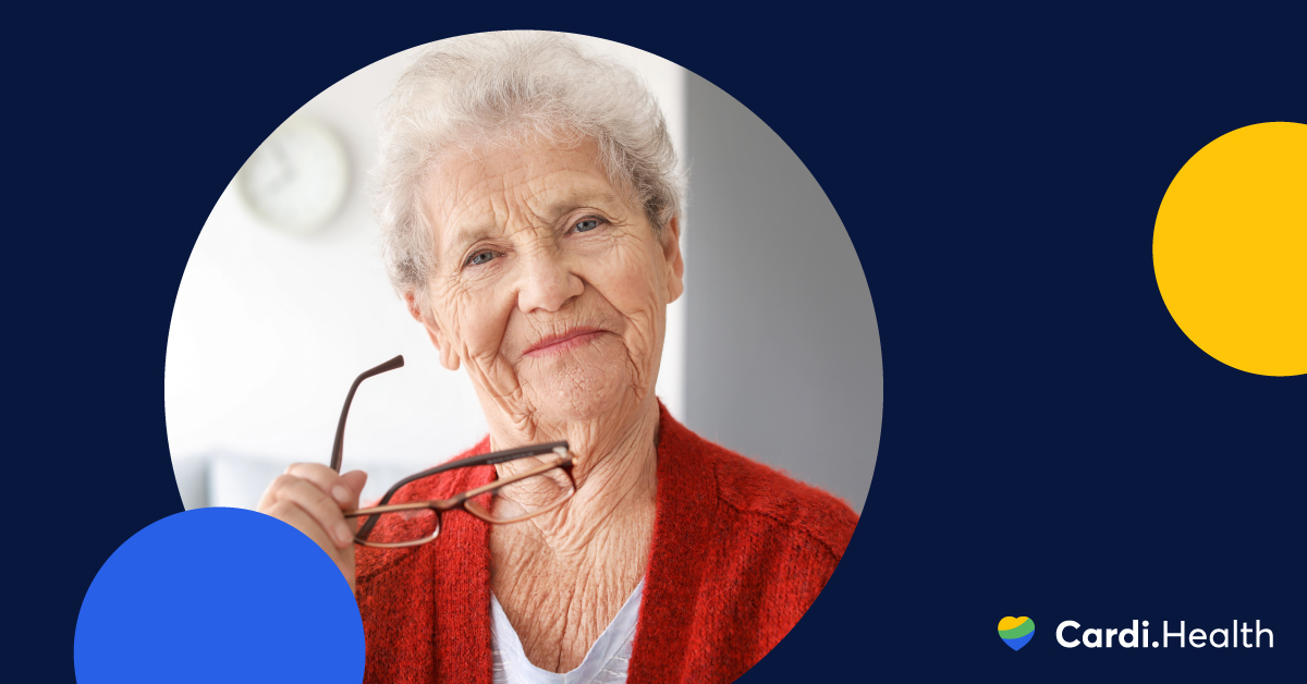 Senior person checking blood pressure with a monitor